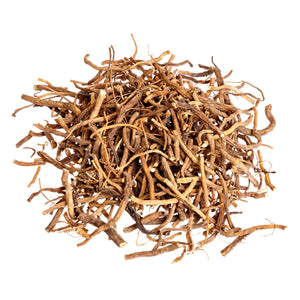 Pile of dried, brown botanical roots isolated on a white background, often used in supplements and wellness products.