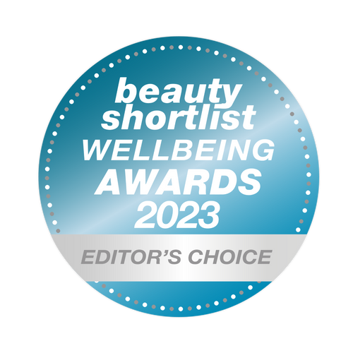 Beauty Shortlist Wellbeing Awards 2023 badge in blue, labeled "Editor's Choice."