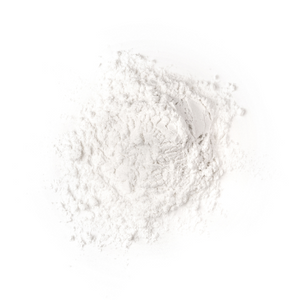 Pile of white collagen powder on a white background, smooth texture, used for beauty and health supplements.
