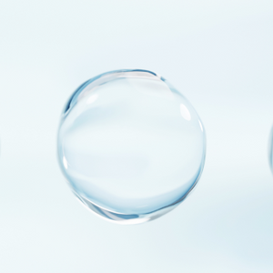 Close-up of a clear, glossy collagen bubble on a light background, emphasizing beauty and skincare supplements.