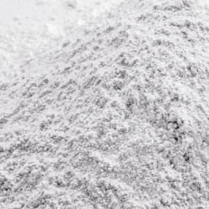 Close-up of a pile of fine white collagen powder, showcasing its texture. Ideal for beauty supplements and skincare.
