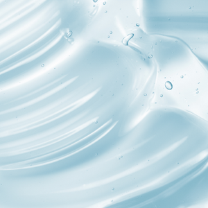 Smooth blue gel texture with tiny air bubbles, resembling a collagen beauty skincare product.