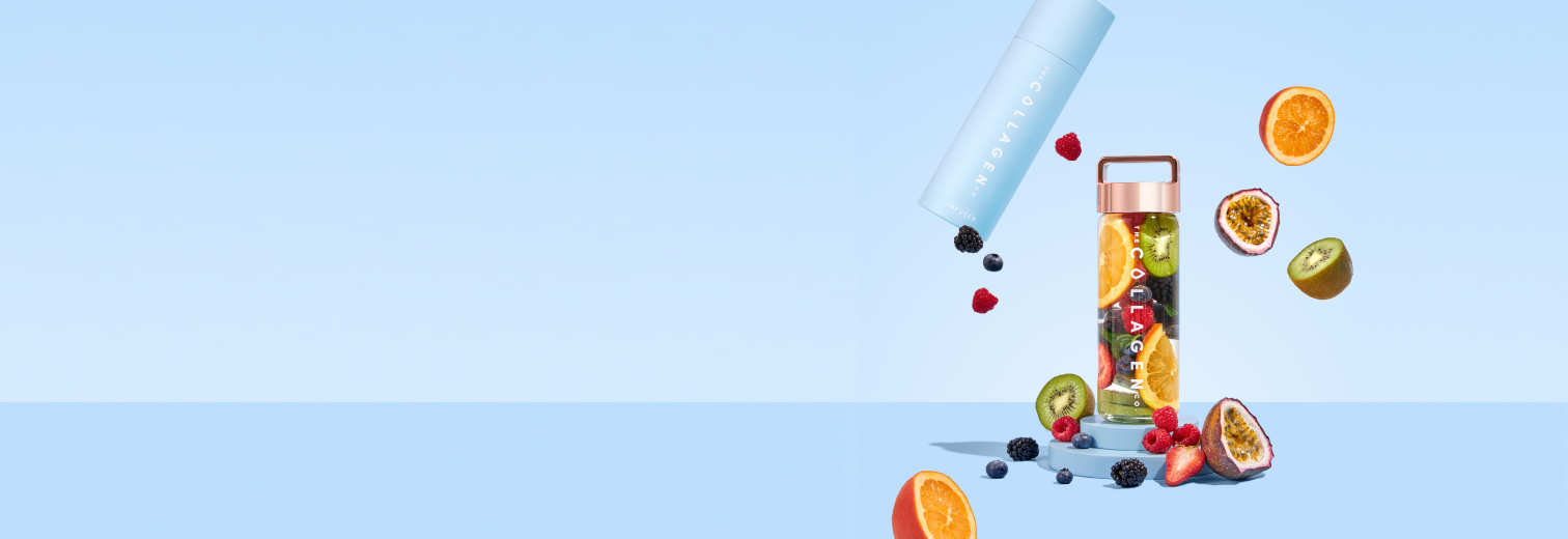 Collagen container with fresh fruits like oranges, berries, and kiwis on a pastel blue background, promoting beauty and wellness supplements.