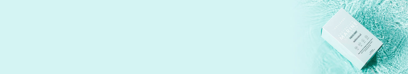 Collagen supplement box on aqua textured fabric; minimalist beauty and skin health theme.