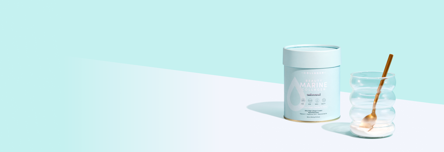 Collagen container and stylish glass with a gold spoon on a light blue background, highlighting beauty and wellness supplements.