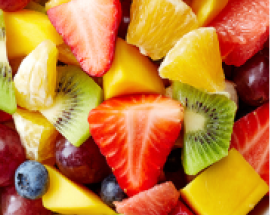 A vibrant assortment of fresh fruits, including strawberries, oranges, kiwi, mango, blueberries, and grapes, showcasing natural beauty and health benefits.