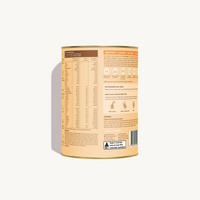 Back of Glow Shake Salted Caramel Milkshake canister showing nutritional panel, ingredients, usage instructions, and product details on a warm cream background.