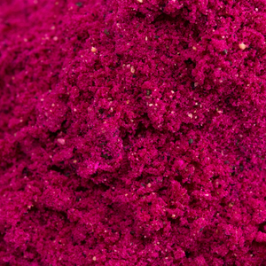 Vibrant pink powder close-up, showcasing a fine texture, ideal for beauty and supplement uses like collagen blends.