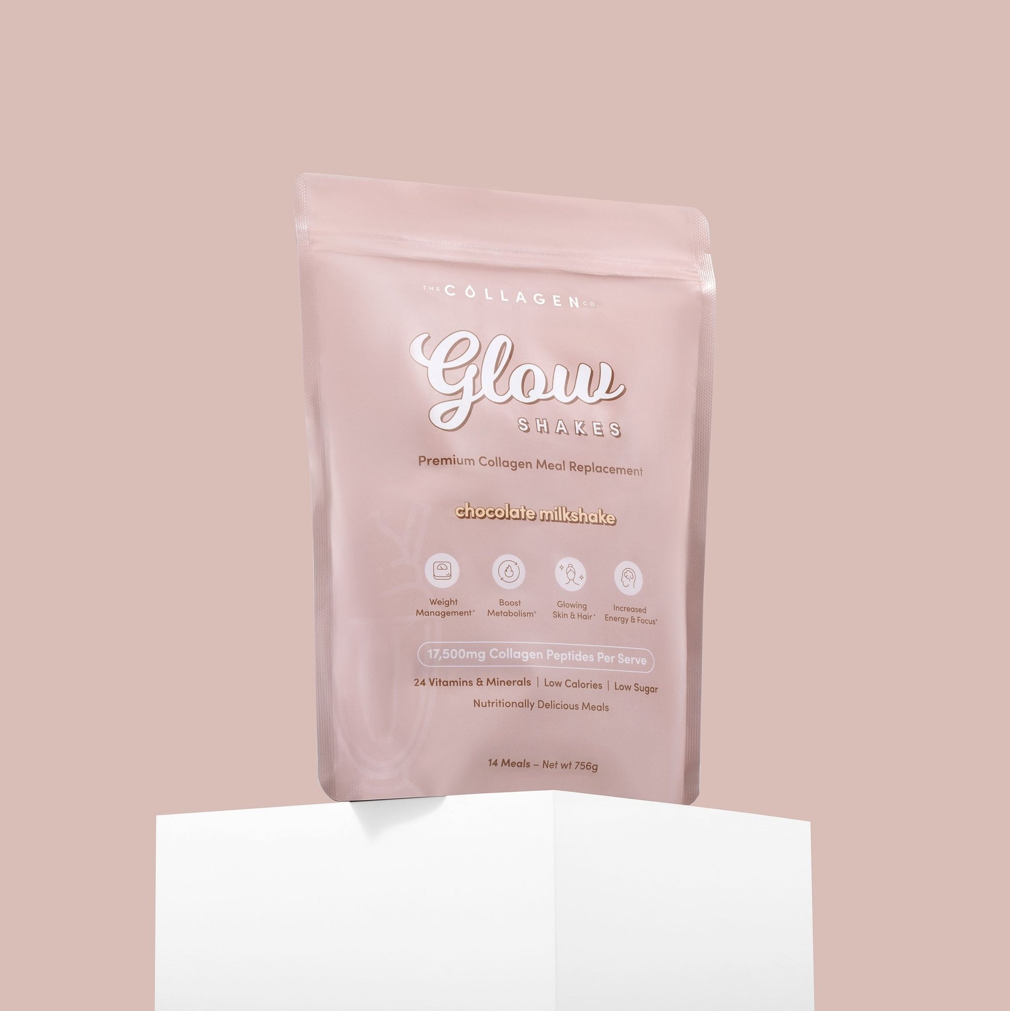 Pink pouch of "Glow Shakes" collagen meal replacement, chocolate milkshake flavor, on a minimalist pedestal.